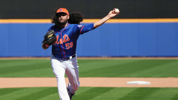 New York Mets relief pitcher Sean Manaea (59) throws batting practice during workouts at spring training.